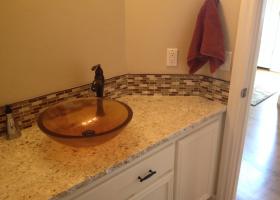 After: granite counter-top, deco splash, vessel sink, new faucet